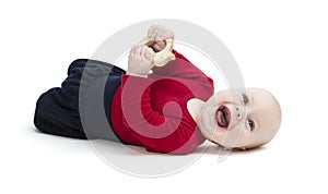 Happy toddler laughing on floor