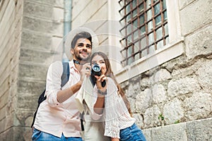 Happy tourist couple in love traveling