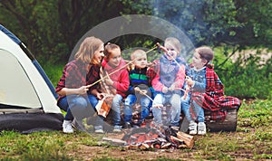 Happy tourist family on journey hike. mother and children fry sa