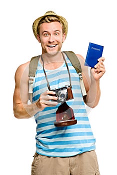 Happy tourist holding passport retro camera isolated on white