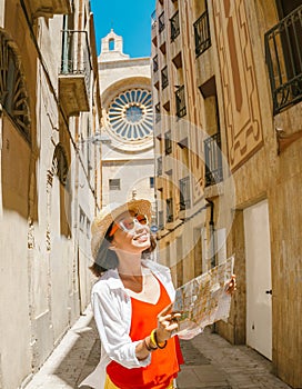 Happy tourist with map in Reus photo