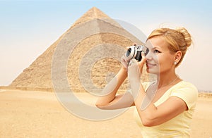 Happy Tourist and Pyramid, Cairo, Egypt. Cheerful Young Blonde