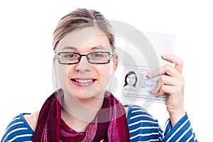 Happy tourist traveller woman with passport