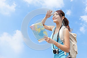 Happy travel woman look map