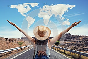 Happy travel woman on vacation concept with world shaped clouds. Funny traveler enjoy her trip and ready to adventure.