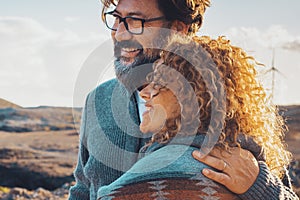 Happy traveler adult couple enjoy outdoor leisure activity in desert coastline beach destination together with love and adventure