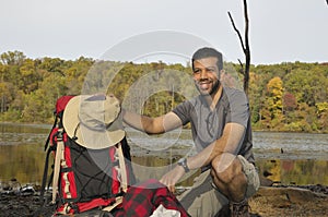 Happy Traveler with Backpacking Equipment