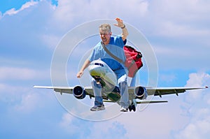 Happy traveler traveling man riding airplane photo