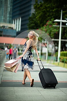 Happy Traveler after shopping... Excited Beautiful Woman wearing