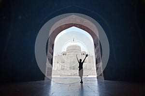 Happy traveler at Taj Mahal