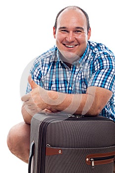 Happy traveller man with luggage