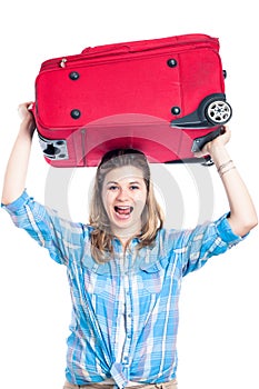 Happy traveller woman with luggage