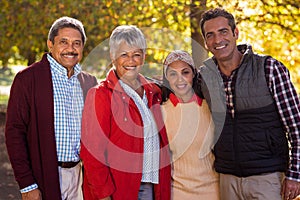 Happy two generation family at park