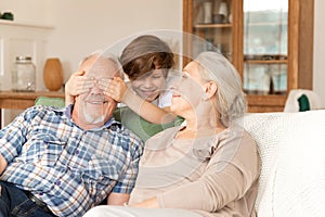 Happy two generations family old grandfather, grandmother and cute child boy