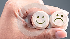 Happy and Unhappy Face on Wood Blocks