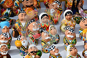 Happy uzbek nation in mini statues