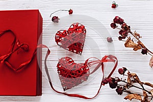 Happy valentine day concept. stylish present and two red hearts