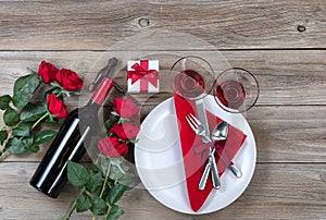 Happy Valentine Dinner Setting on rustic wooden background