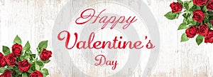 Happy Valentine`s Day background banner panorama - bunch bouquet of red roses isolated on rustic bright white vintage wooden