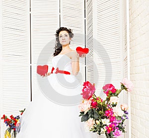 Happy Valentine's Day. Bride with red heart. Wedding and Valentine concept.