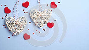 Happy Valentine`s day concept. Handmade hearts on pastel blue background. Greeting card mockup with symbol`s of love for
