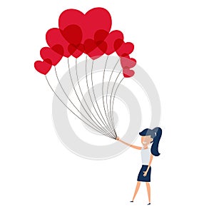 Happy valentine`s day concept of love. Girl holding a lot of heart balloon. Falling in love.