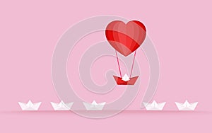 Happy valentine`s day concept of love. Outstanding the Boat rises above with heart shape hot air balloon