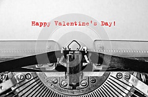 Happy Valentine`s Day greeting printed on an old typewriter