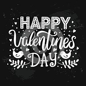 Happy Valentine`s day hand drawn lettering on distressed chalk board
