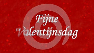 Happy Valentine's Day text in Dutch Fijne Valentijnsdag turns to dust from left on red background