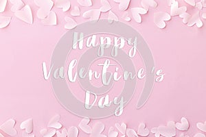 Happy Valentine`s Day text on stylish hearts on pink background, flat lay. Happy Valentines Day greeting card. Be my Valentine.