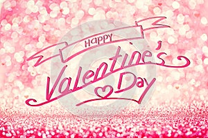 HAPPY VALENTINE`S DAY writing on glittery pink background photo