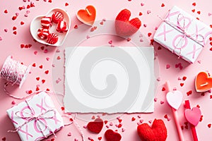 Happy Valentines Day greeting card design. Top view blank paper card, gifts, ribbon, confetti on pink background. Love, romance