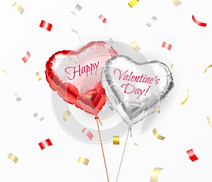 Happy Valentines Day. Pair of heart shaped helium balloons from silver and red foil with congratulatory text with flying confetti