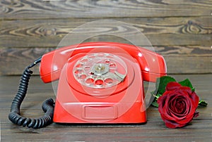 Happy Valentines Day: Vintage red telephone and red rose