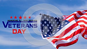 Happy Veterans Day with American flags on blue sky background