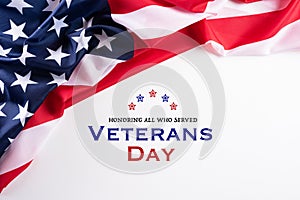 Happy Veterans Day. American flags with the text thank you veterans against a white background. November 11