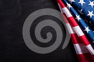 Happy Veterans Day. American flags veterans against a blackboard background