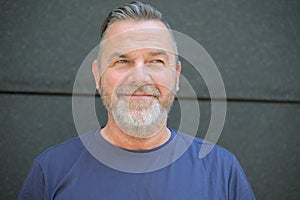 Happy vivacious bearded middle aged man portrait