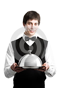 Happy waiter with cloche lid cover photo