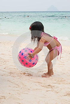 Happy walking child on the sea