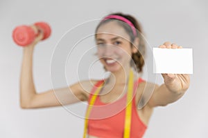 Happy weight loss woman showing empty card