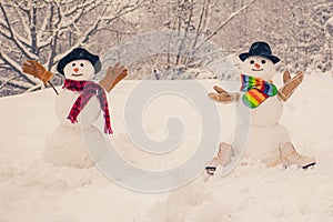 Happy winter time. Christmas party people. Two Happy smiling snowman on sunny winter day. Sensual snowman couple