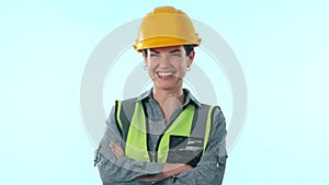 Happy woman, architect and arms crossed of professional with hard hat against a studio background. Portrait of female