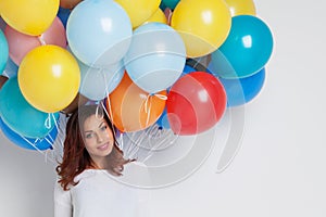 Happy woman with balloons