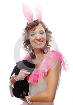 Happy woman with black rabbit