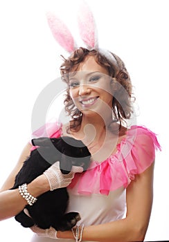 Happy woman with black rabbit