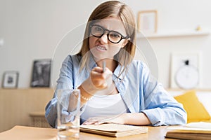 Happy woman blogger applicant teacher sit at home office look at camera doing online job interview during video chat