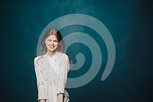 happy woman in blue hat on dark background and shirt model Copy Space