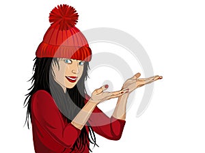 Happy woman in a cap showing gesture with two hands
